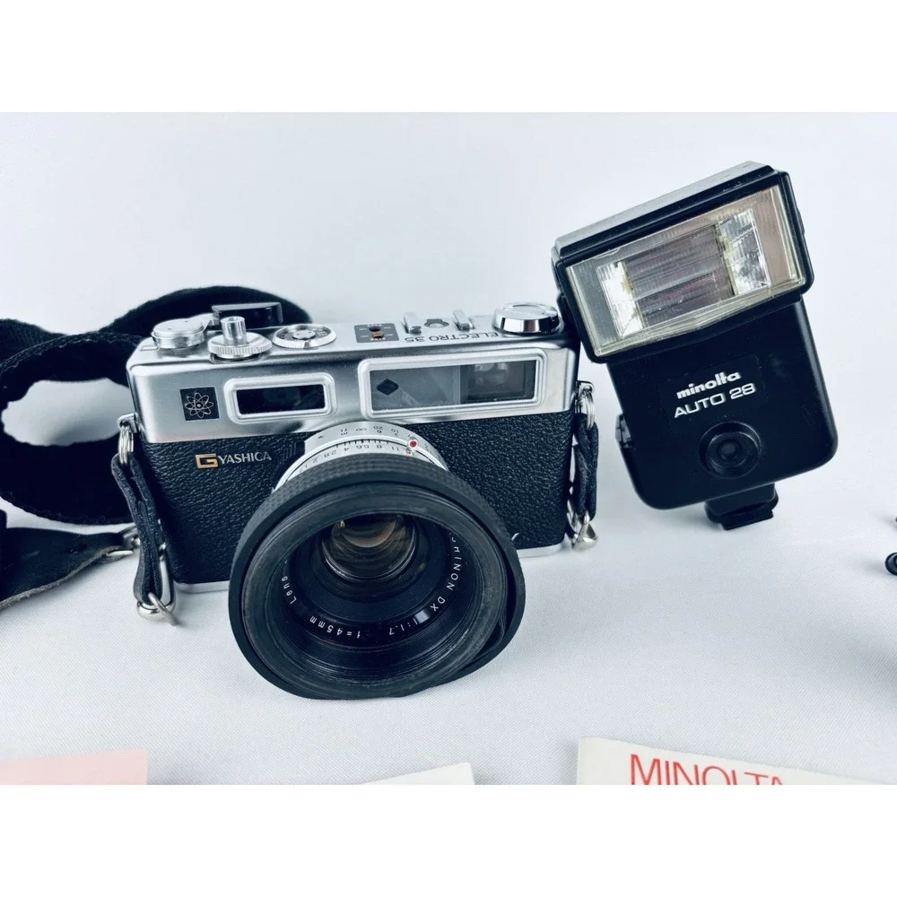 Yashica Vintage Electro 35 GSN Camera & Minolta Electroflash 28 & Film & Books
